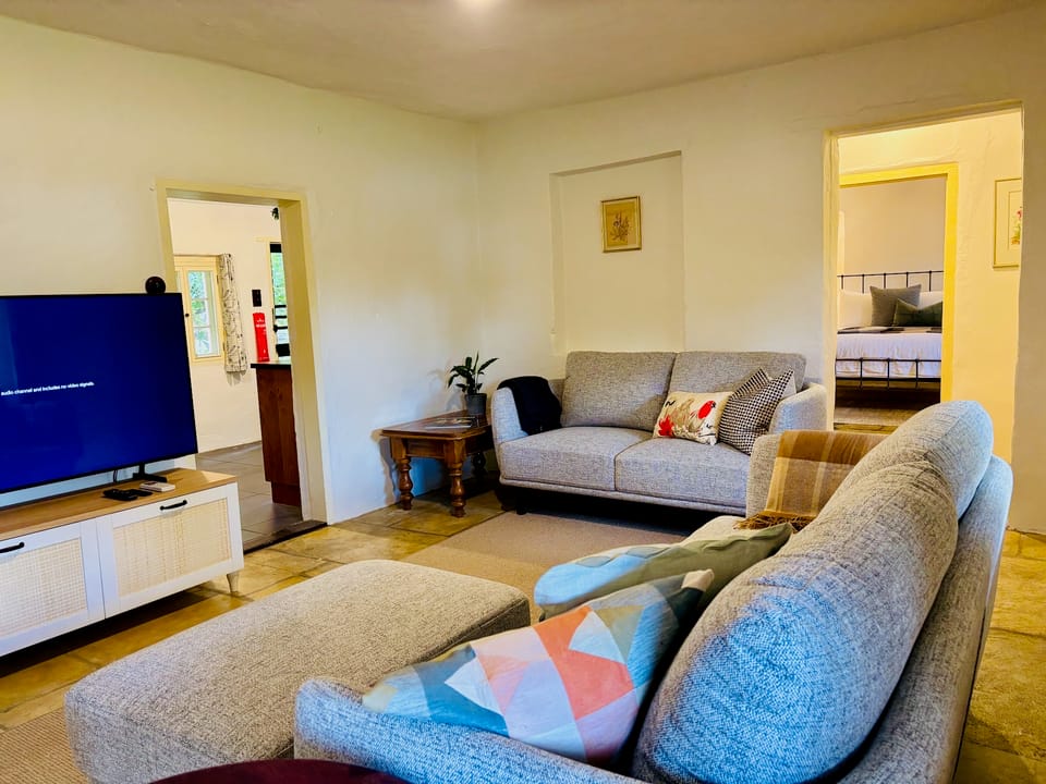 Image of the living room in the Flaxman cottage.