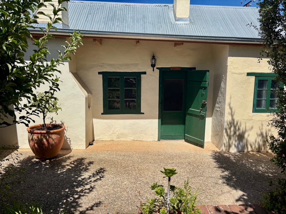 Image of the outside door of the Menge cottage.